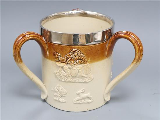 A large Doulton Lambeth Harvest ware silver-mounted three-handled tyg, H. 17.5cm